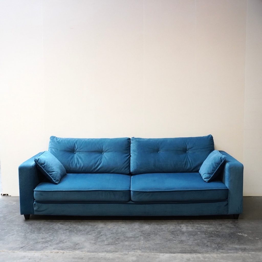 Canapé en velours bleu