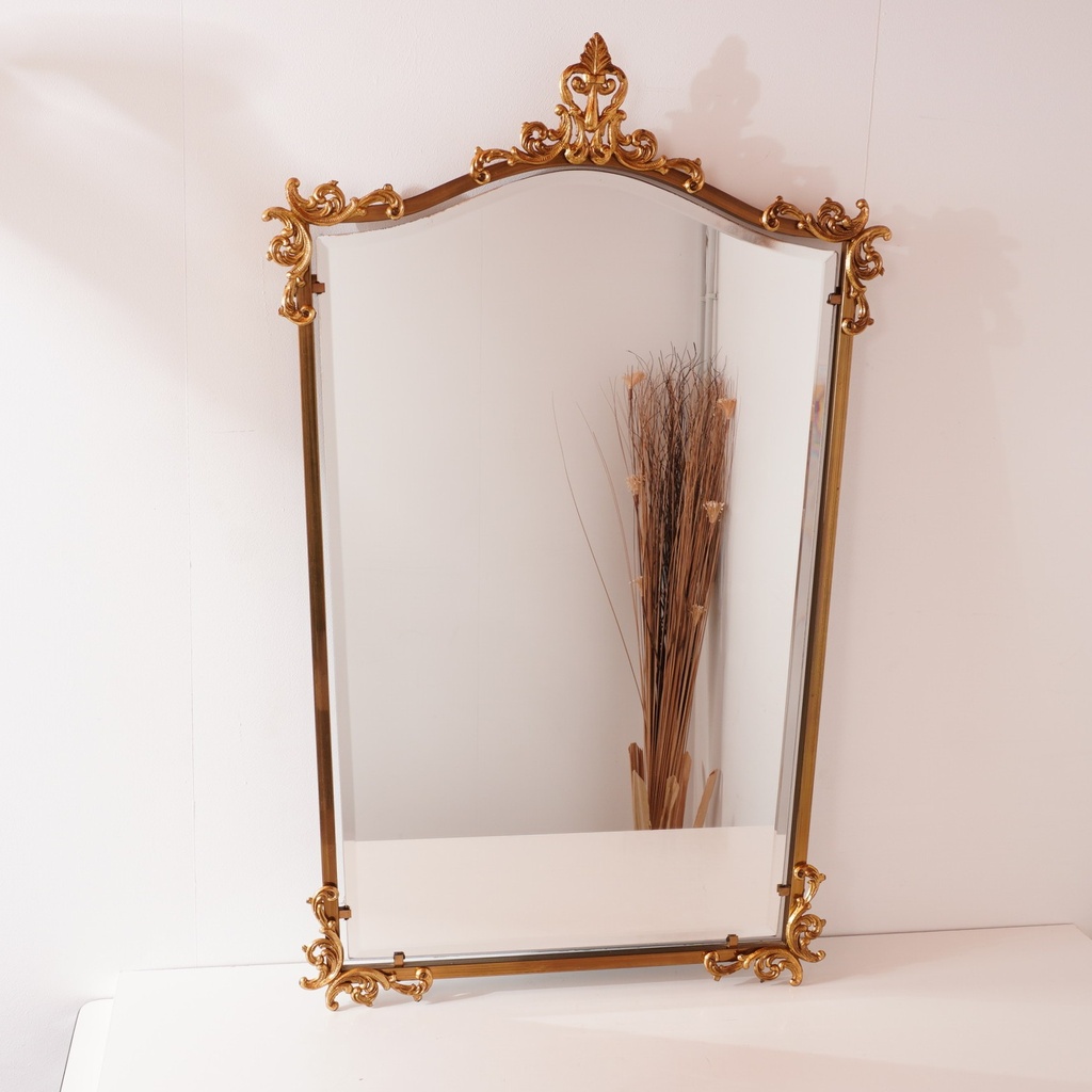 Miroir en métal doré