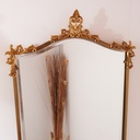 Miroir en métal doré