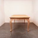 Table à allonges en bois aérogommé