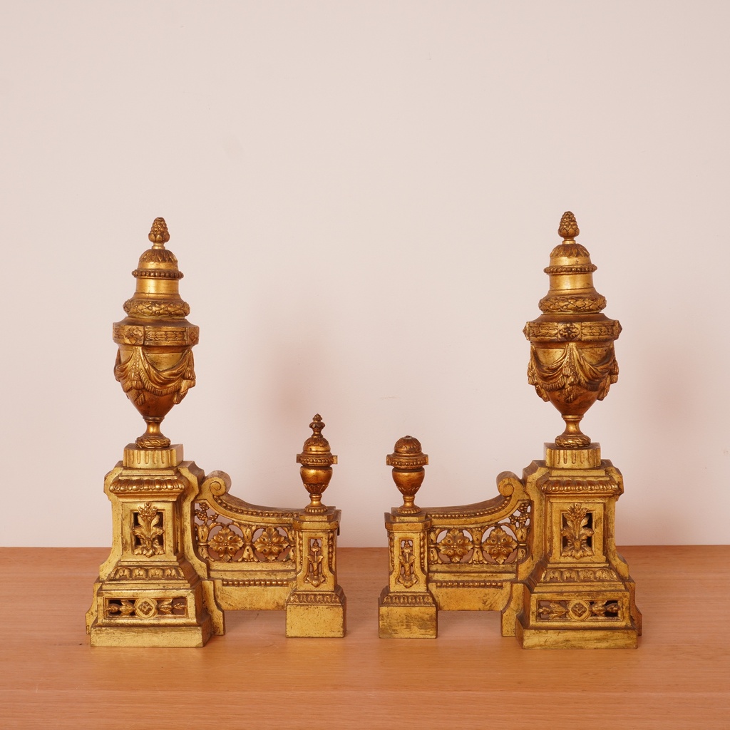 Chenets de cheminée en métal doré