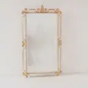 Miroir en métal doré vintage