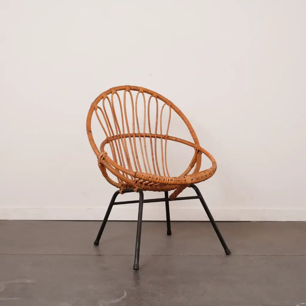 Fauteuil coquille rotin vintage