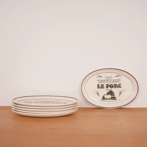 [SU2798] Série 6 assiettes "Les aventures du boucher" GIEN